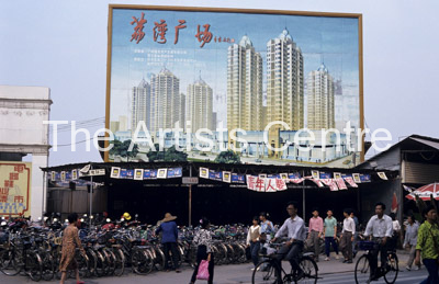 Street scene with bikes and pedestrians in Guangzhou China