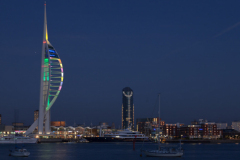 Night view of Spinnaker Tower and historical Portsmouth harbour Hampshire England