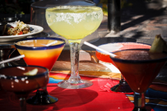 Glasses of colourful cocktails