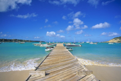 Sea,  beach and wooden jetty at Road Bay Anguilla Caribbean