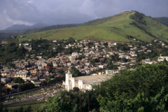 Landscape scene of town and hills in Dominca